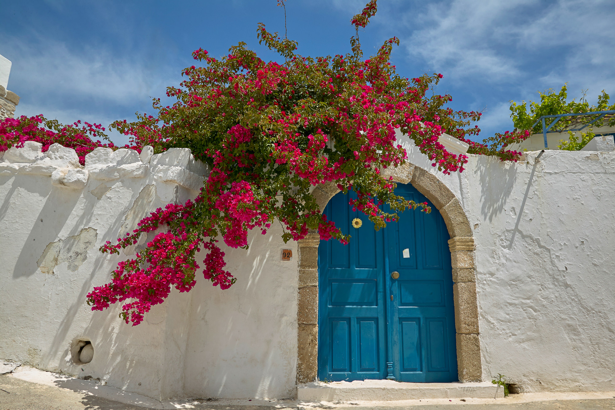 front door framed by bugainvilea, Rhodes
